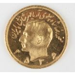 An Iran gold five pahlavi 1977.Buyer’s Premium 29.4% (including VAT @ 20%) of the hammer price. Lots