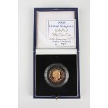 An Elizabeth II Royal Mint gold proof fifty pence 1998 commemorating the 25th Anniversary of the