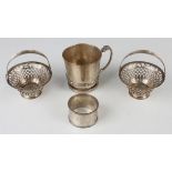 A George VI silver christening tankard with Celtic band, Birmingham 1938 by Adie Brothers Ltd,