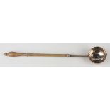A George I silver punch ladle, the circular bowl with outswept rim and turned wood handle, London