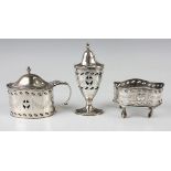 A George V silver three-piece condiment set, comprising salt (lacking liner), pepper and mustard,