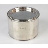 A George V silver novelty box and cover in the form of a paint pot, the cover initial engraved,