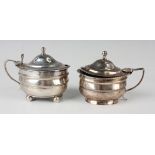 A George III silver oval mustard with hinged lid and knop finial, on ball feet, London 1809 by