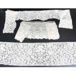 A selection of 19th century lace, including a Venetian border, finely worked with trailing