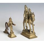 A 19th century Indian brass figure group of Shiva and Parvati on horseback, height 19cm, together