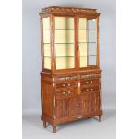A late 19th century French Louis XVI style mahogany and gilt metal mounted library bookcase by