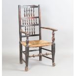 A 19th century ash spindle back armchair with a rush seat and turned legs, height 111cm, width
