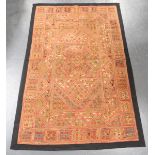 An early 20th century North Indian Kutch embroidered and mirror work panel, 150cm x 102cm.Buyer’s