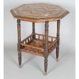 An early 20th century colonial specimen wood two-tier occasional table, the geometric decorated