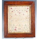 An early George III needlework sampler by Hani Bardwell, dated June 25 1764, finely worked in