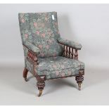 A Victorian mahogany gentleman's armchair, raised on reeded legs fitted with gilt brass 'Cope &