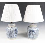 A pair of late 19th century provincial Chinese blue and white porcelain ginger jars and covers,