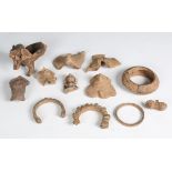 A group of archaeological pottery fragments, probably Indian, and a group of similar metal bangle
