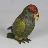 An early 20th century Austrian cold painted cast bronze model of a green parrot, height 8cm.Buyer’