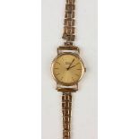 A Seiko Quartz 9ct gold lady's bracelet wristwatch, the signed circular gilt dial with baton hour
