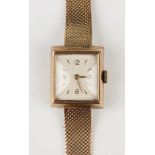 A Longines 9ct gold rectangular cased lady's wristwatch, the signed jewelled movement numbered '