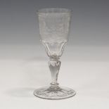 A mixed group of glassware, 18th century and later, including an engraved German soda glass wine