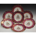 Seventeen Ridgway armorial dessert plates, circa 1850, of shaped circular form, each painted to