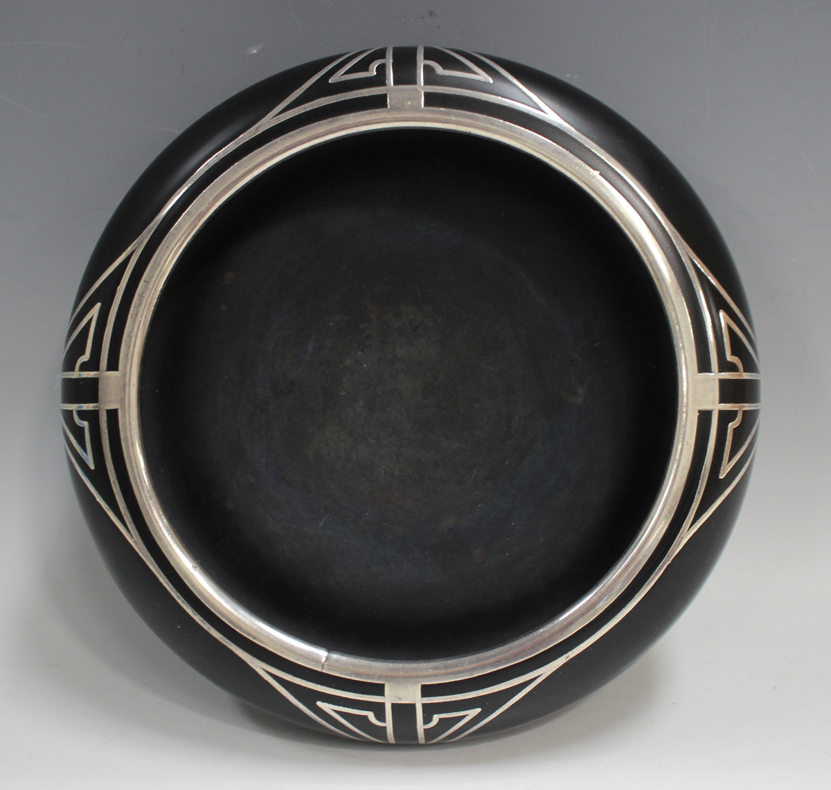 A black glass and silver inlaid circular bowl, in the Art Deco taste, indistinct number to base, - Image 3 of 3