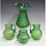 Two Loetz Neptun pattern green iridescent glass jugs, early 20th century, of globe and shaft form