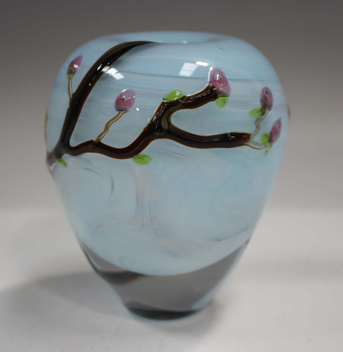 A Siddy Langley studio glass vase, circa 2022, decorated with budding tree branches against a pale - Image 7 of 7