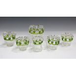 Six clear glass posy vases, in the style of Stevens and Williams, late 19th century, of moulded