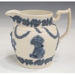 A feldspathic stoneware Queen Caroline commemorative jug, circa 1820, the white body sprigged in