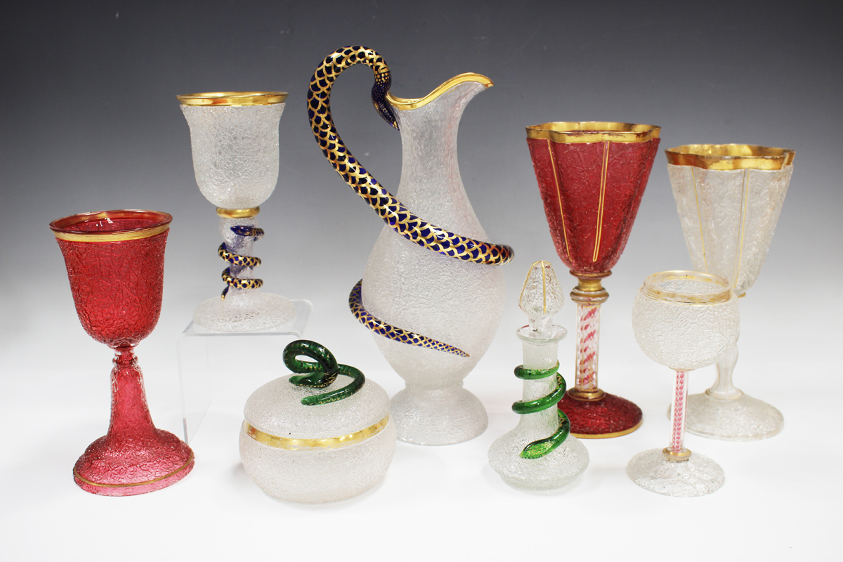 A craquelure ice glass ewer with snake handle, probably French, circa 1850, the pear shaped body