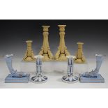 A pair of Ridgway buff stoneware candlesticks, circa 1835, of foliate moulded form with acanthus