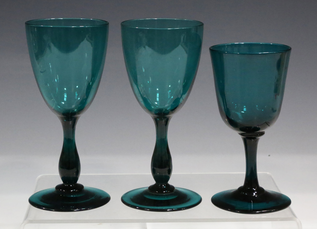 A matched set of eight green glass wines, late 19th/20th century, each conical bowl engraved with - Image 3 of 3