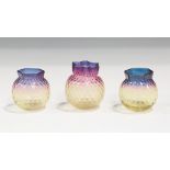 A matched pair of Alexandrite glass posy vases, Thomas Webb & Sons, circa 1900, the dimpled