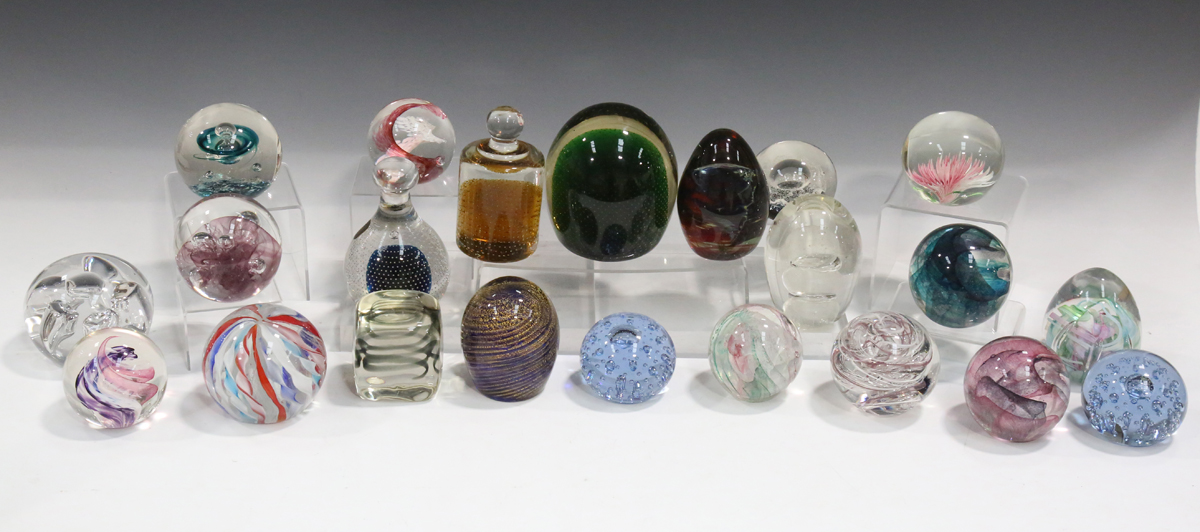 Twenty-two glass paperweights, including two limited edition Selkirk paperweights, comprising
