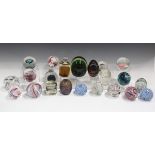 Twenty-two glass paperweights, including two limited edition Selkirk paperweights, comprising