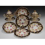 A Ridgway relief moulded part dessert service, circa 1825, painted with floral sprays within