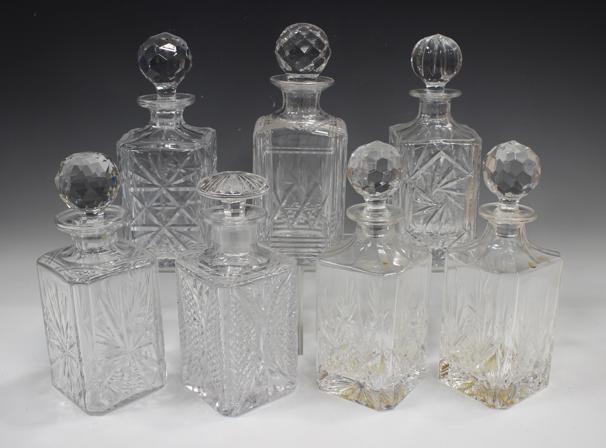 A mixed group of twenty-five assorted glass decanters and stoppers, 20th century, mostly cut - Image 3 of 4