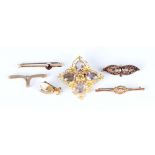 A Victorian gilt metal and pale amethyst four stone brooch, width 4.9cm, a gilt metal and Bohemian