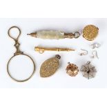 A small group of jewellery, including a 19th century spherical pendant drop with applied bead and