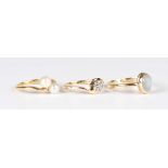 An 18ct gold and cultured pearl ring in a crossover design, weight 2.7g, ring size approx K1/2, a