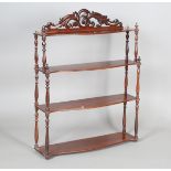 A Victorian mahogany graduated four-tier wall shelf with carved foliate frieze, height 83cm, width