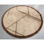 A Nattier circular rug, late 20th century, the abstract Art Deco style field with angular lines,