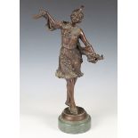 A modern brown patinated bronze model of an Art Deco dancer, mounted on a green marble plinth,