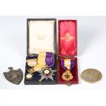 A group of three Primrose League medals, a silver commemorative Queen Mary medallion and a
