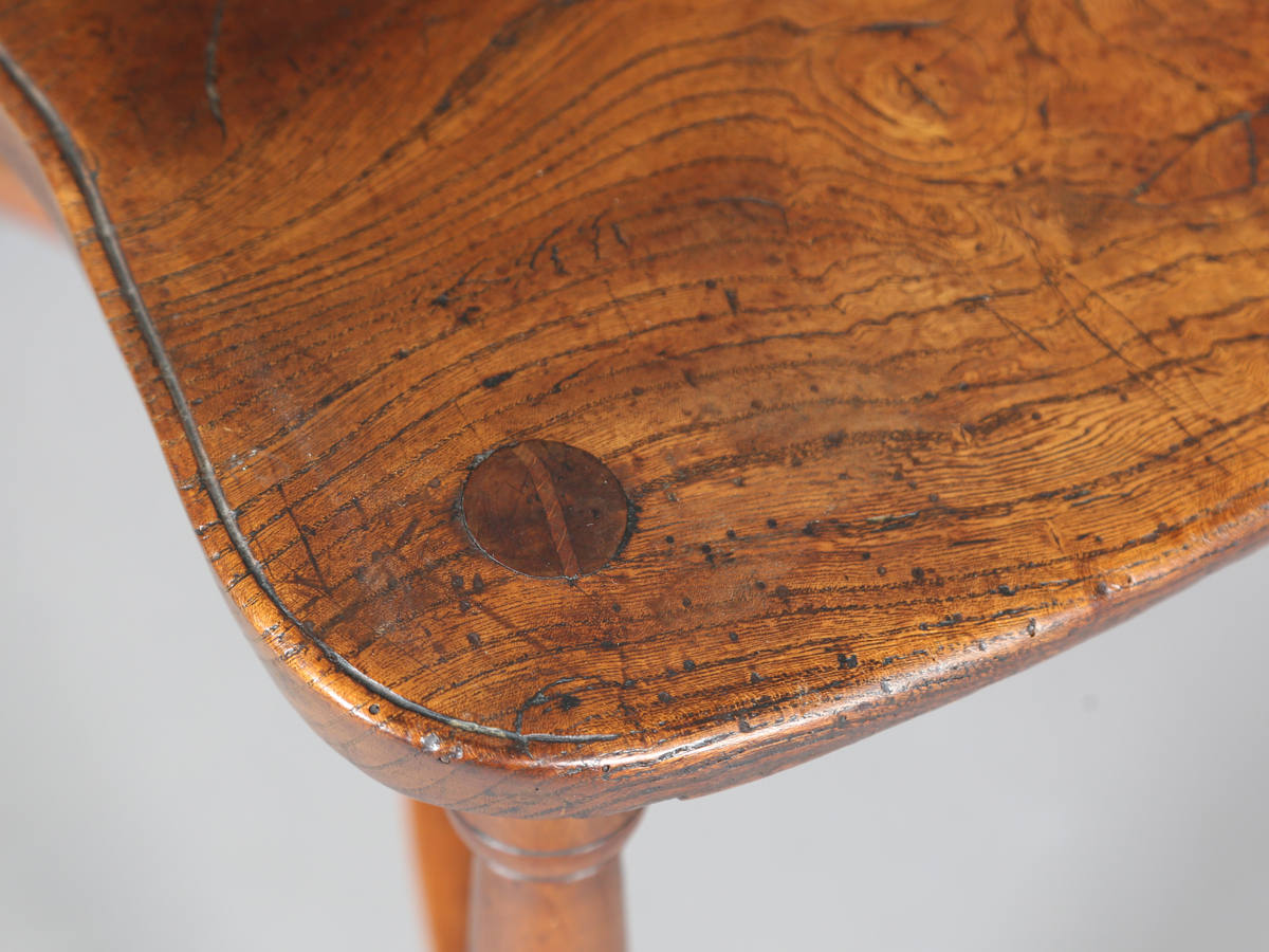 An early Victorian yew and elm stick and wheel back Windsor armchair with shaped panel seat and - Image 7 of 14
