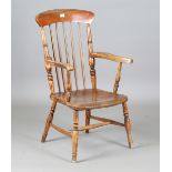 A 19th century ash and elm Windsor armchair, height 108cm, width 55cm, depth 57cm.Buyer’s Premium