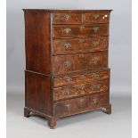 A 20th century George I style walnut chest-on-chest, the oak-lined drawers with feather and