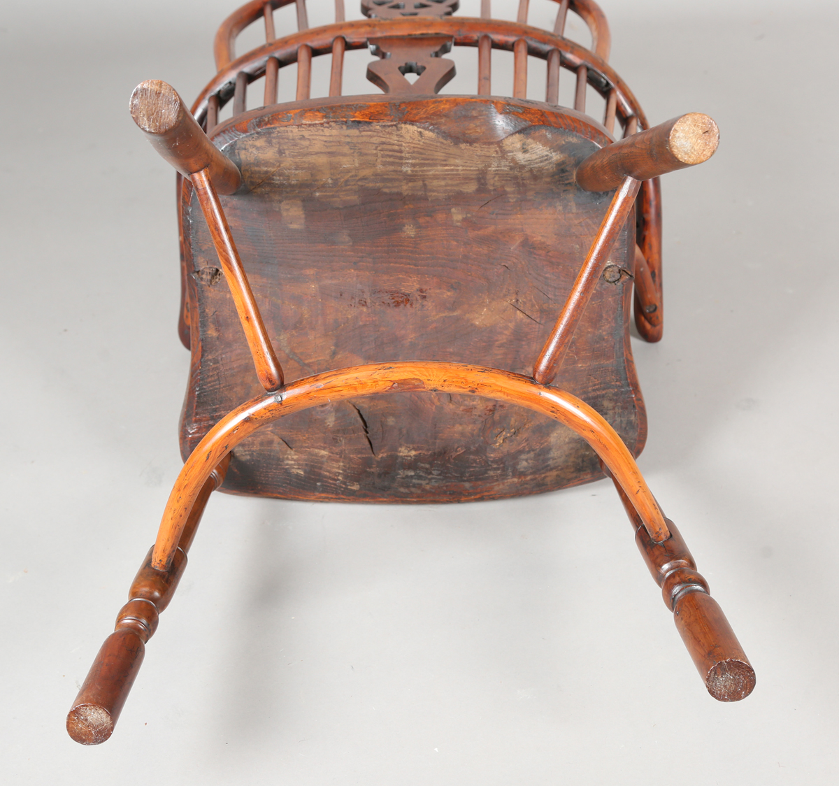 An early Victorian yew and elm stick and wheel back Windsor armchair with shaped panel seat and - Image 3 of 14