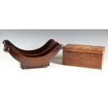 A George III mahogany cheese coaster of typical boat form, width 44cm (lacking one castor), together