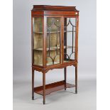 An Edwardian mahogany display cabinet, crossbanded in satinwood, on square tapering legs and spade