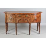 A George III mahogany bowfront sideboard with ebony stringing, on ring turned legs, height 93cm,