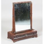 A George II mahogany swing frame mirror, the base fitted with three drawers, height 57cm, width